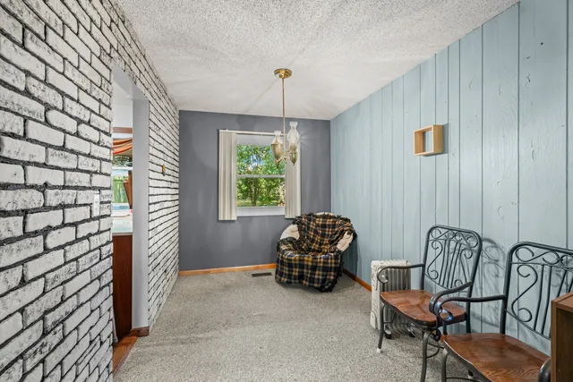 a view of a livingroom with furniture