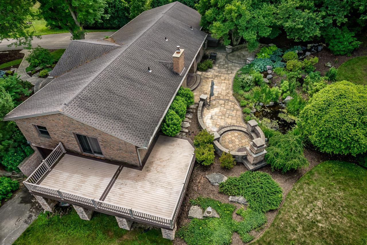 10694 Saddle Path Road Belvidere, IL 61008 - Photo 34 of 49 an aerial view of a backyard with sitting area