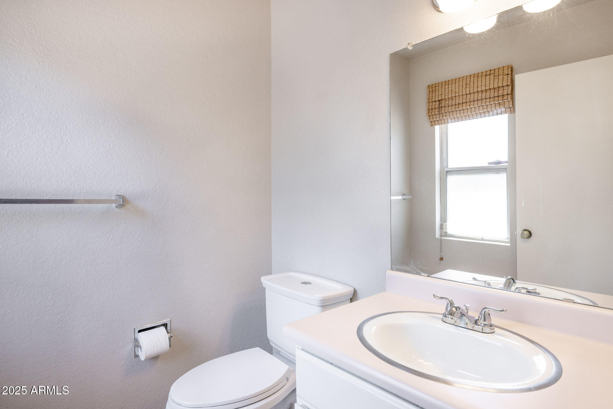 5701 East Sandy Lane Scottsdale, AZ 85254 - Photo 23 of 48 a bathroom with a sink a toilet and mirror