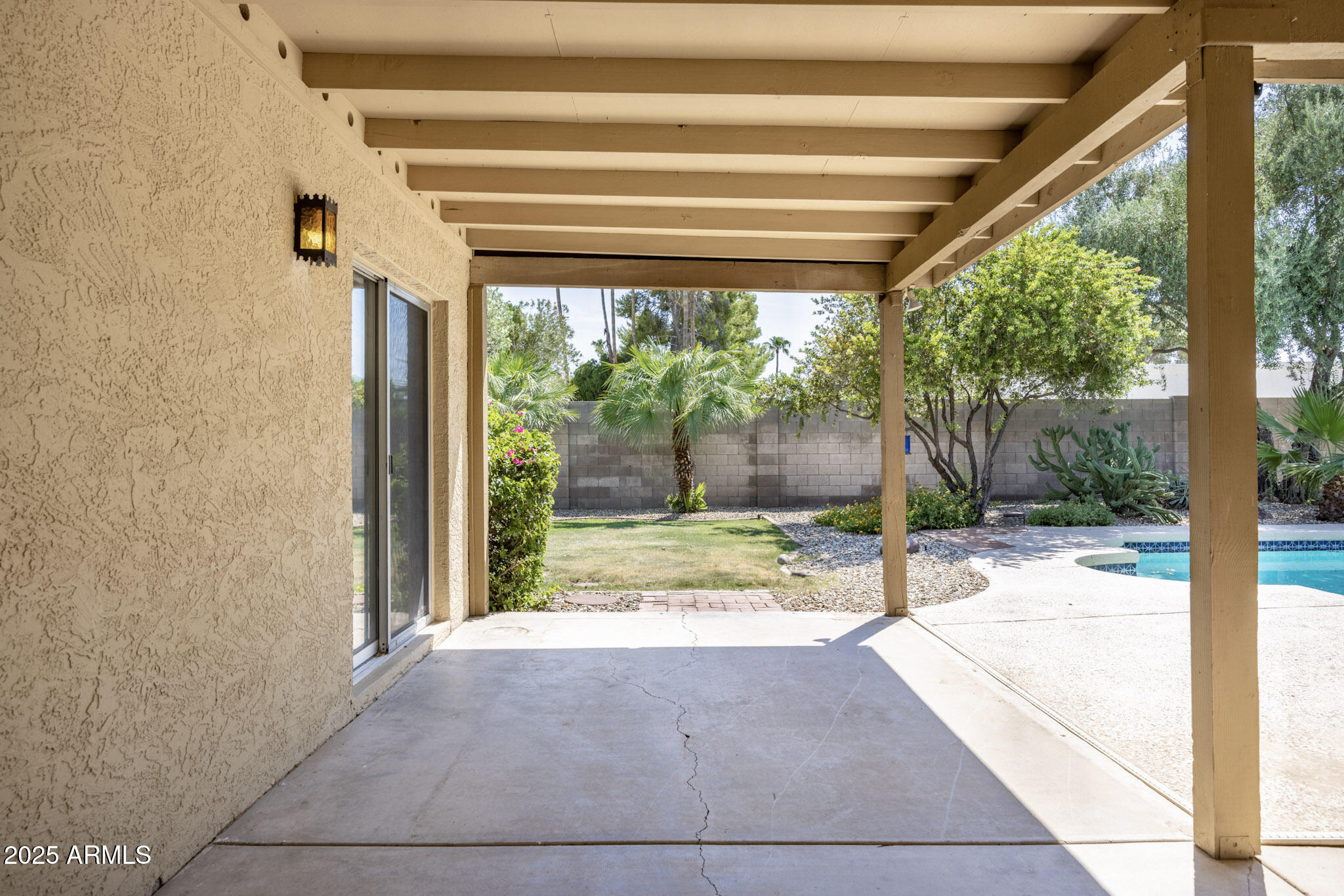 5701 East Sandy Lane Scottsdale, AZ 85254 - Photo 37 of 48 a view of a porch with a back yard
