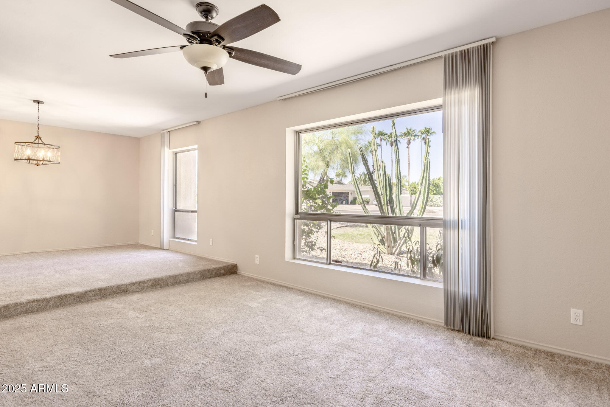 5701 East Sandy Lane Scottsdale, AZ 85254 - Photo 7 of 48 a view of an empty room with a window