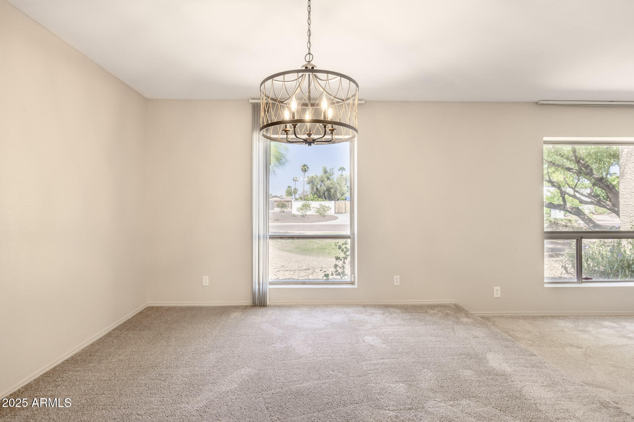 5701 East Sandy Lane Scottsdale, AZ 85254 - Photo 9 of 48 a view of an empty room with a window