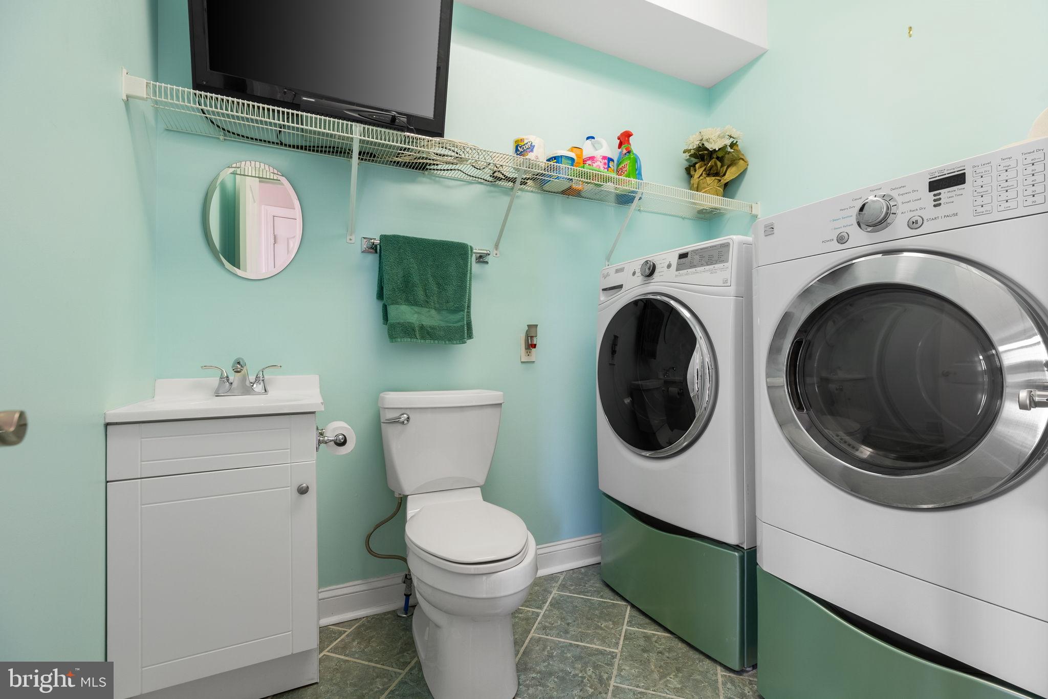 81 Devalinder Drive Newark, DE 19702 - Photo 21 of 43 Main floor laundry room includes a half bath