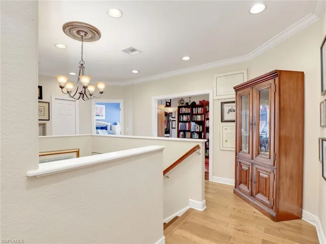 a spacious bathroom with a double vanity sink and a mirror