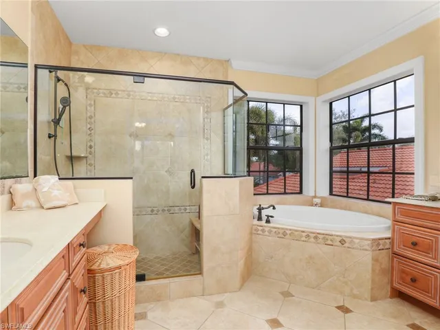 a bathroom with a bathtub and a sink