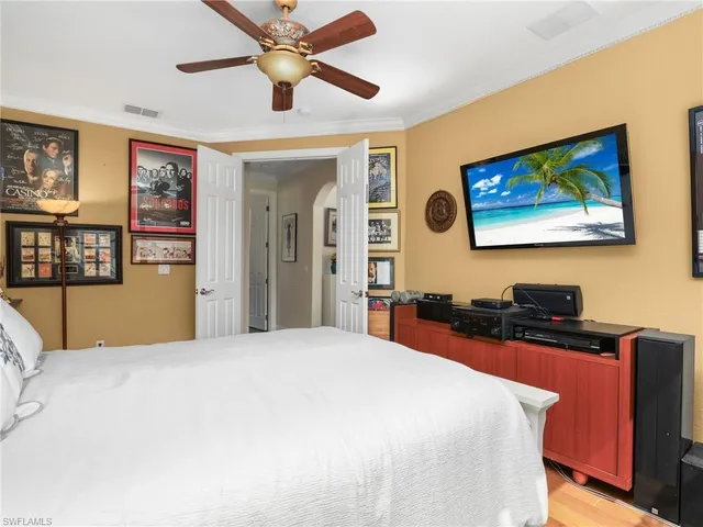 a bedroom with furniture and window