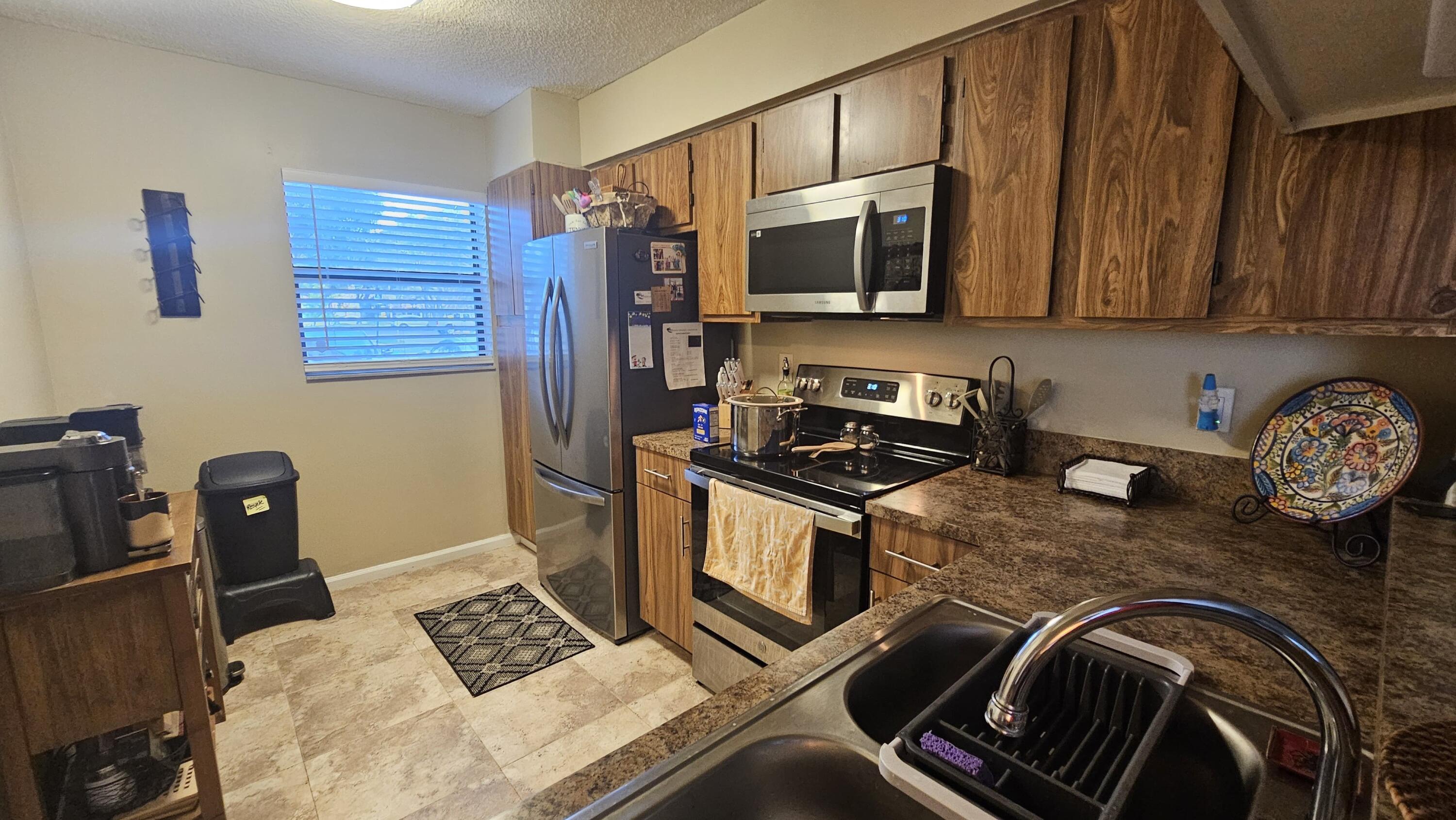 3119 Millwood Terrace, Unit 139 Boca Raton, FL 33431 - Photo 27 of 32 M139 KITCHEN