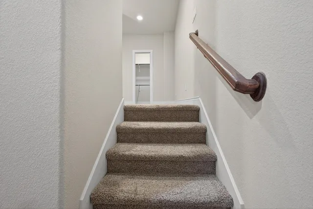 a view of a swimming pool with a yard