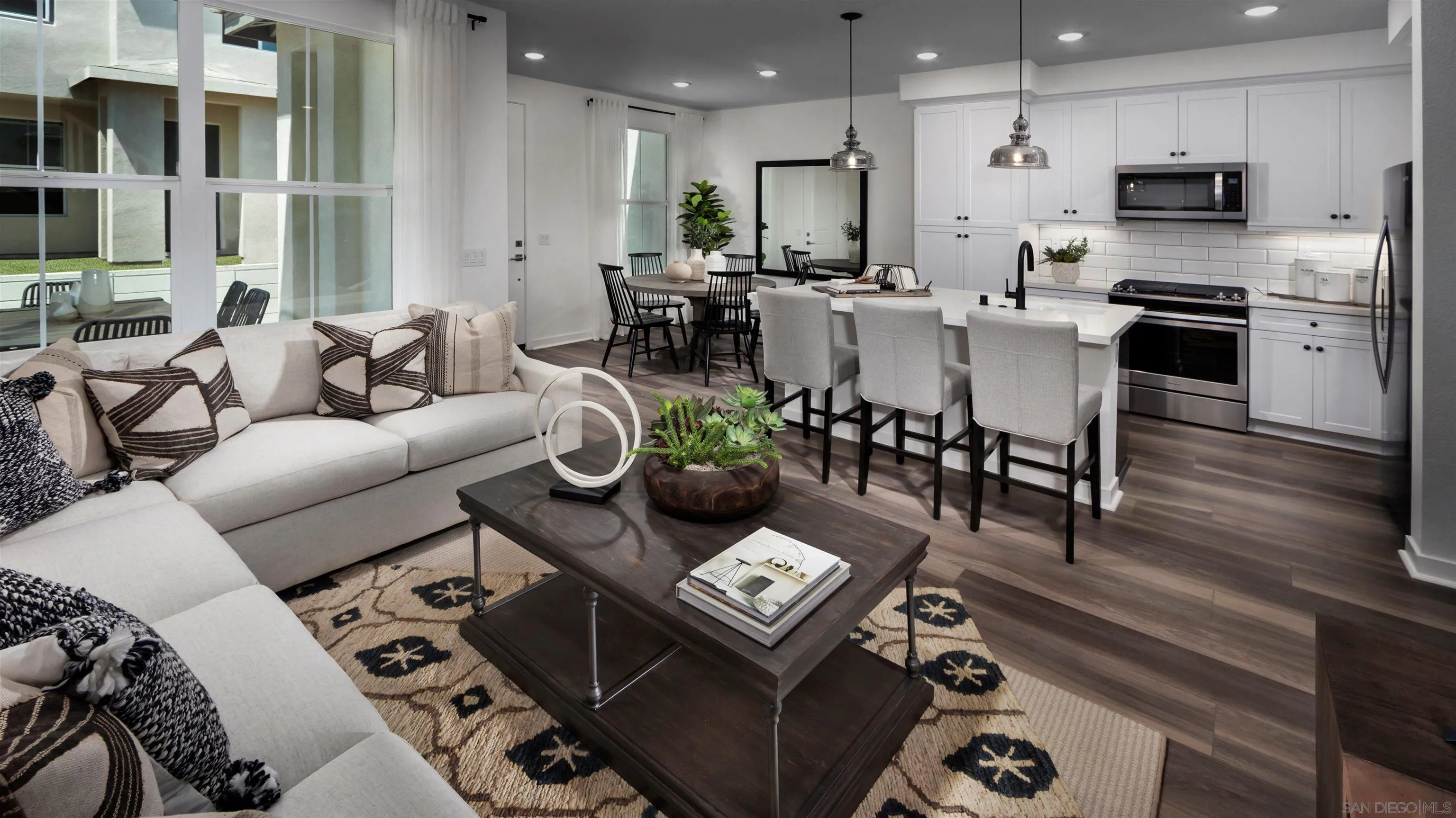 13084 Olympus Circle, Unit 2 Poway, CA 92064 - Photo 1 of 18 a living room with lots of furniture and kitchen view