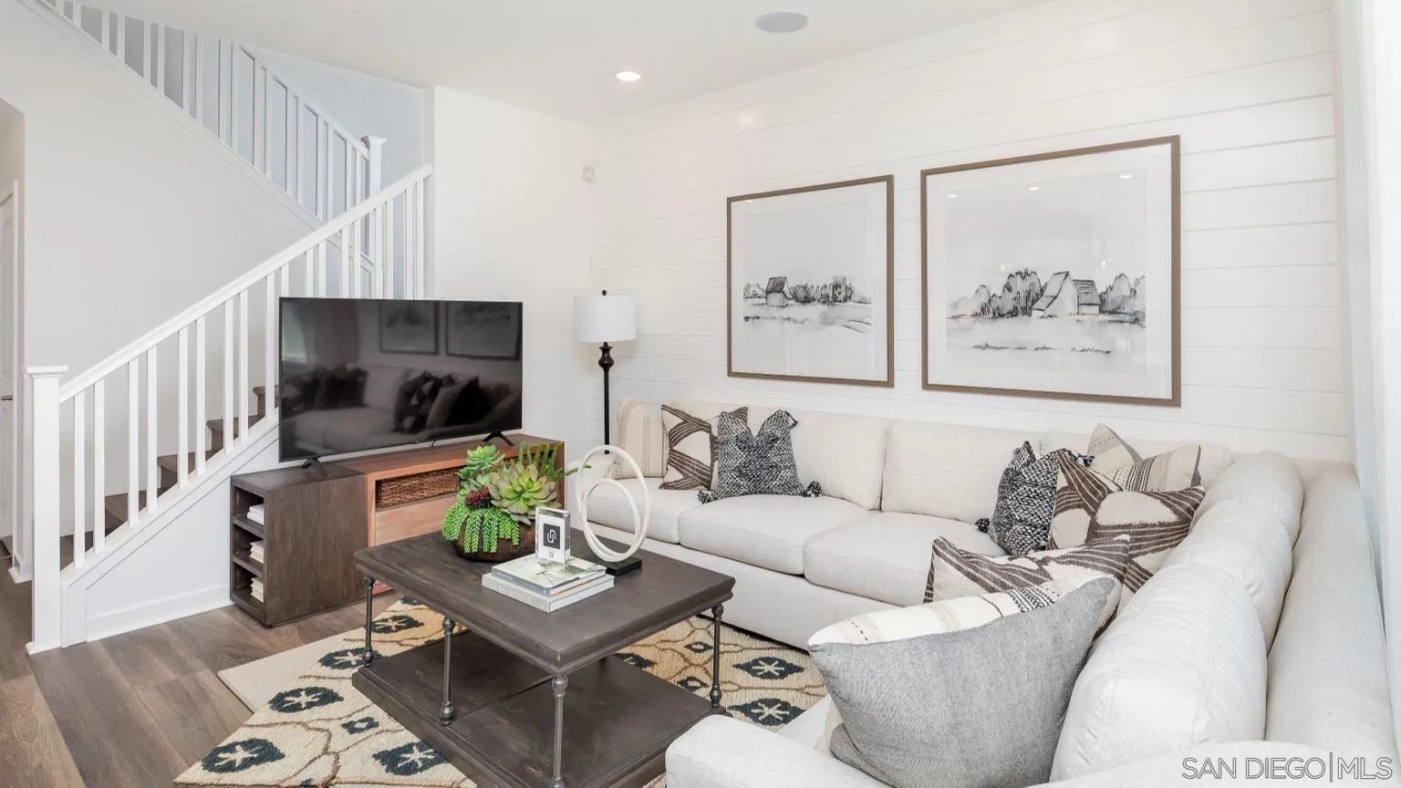 13084 Olympus Circle, Unit 2 Poway, CA 92064 - Photo 7 of 18 a living room with furniture and a painting