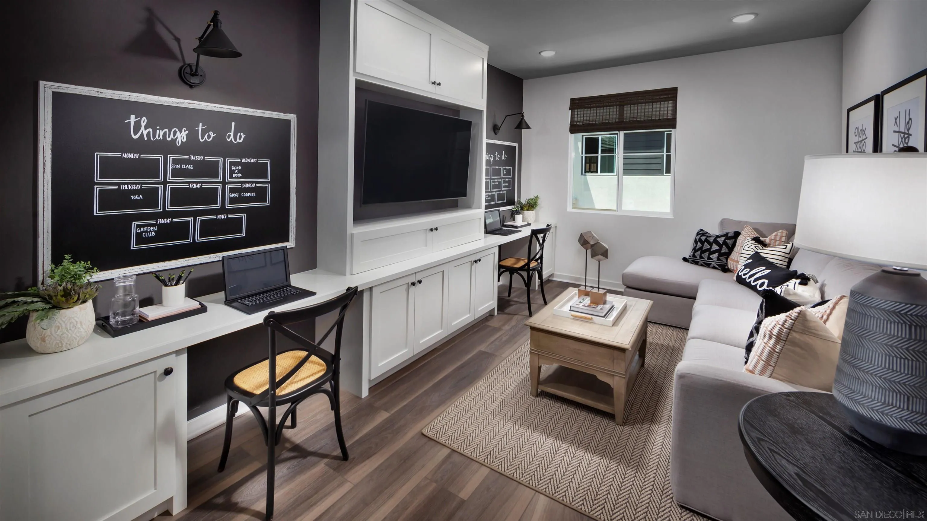 13084 Olympus Circle, Unit 2 Poway, CA 92064 - Photo 9 of 18 a living room with furniture a flat screen tv and kitchen view