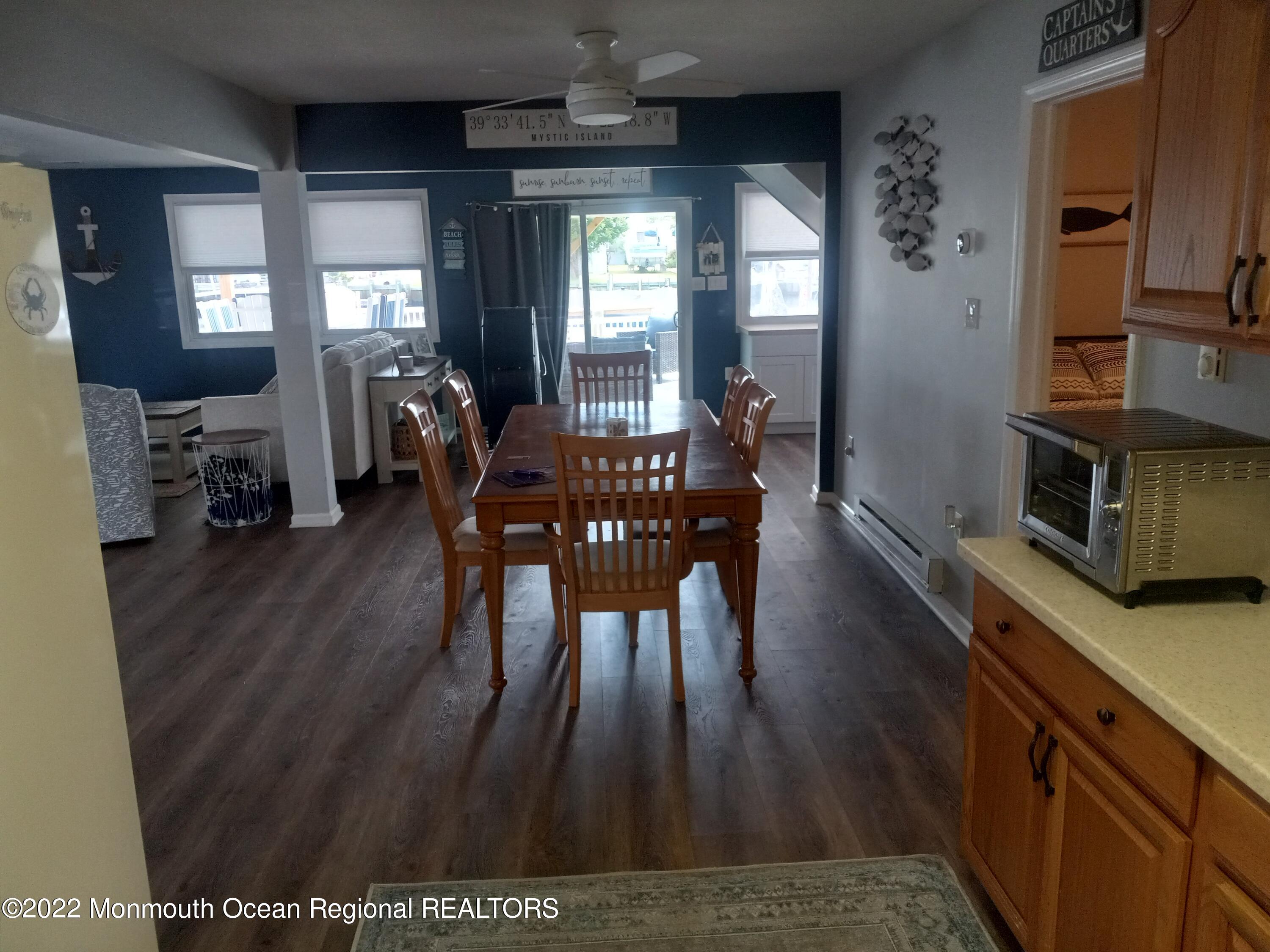 22 Ship Drive Little Egg Harbor, NJ 08087 - Photo 16 of 45 a view of a dining room with furniture window and wooden floor