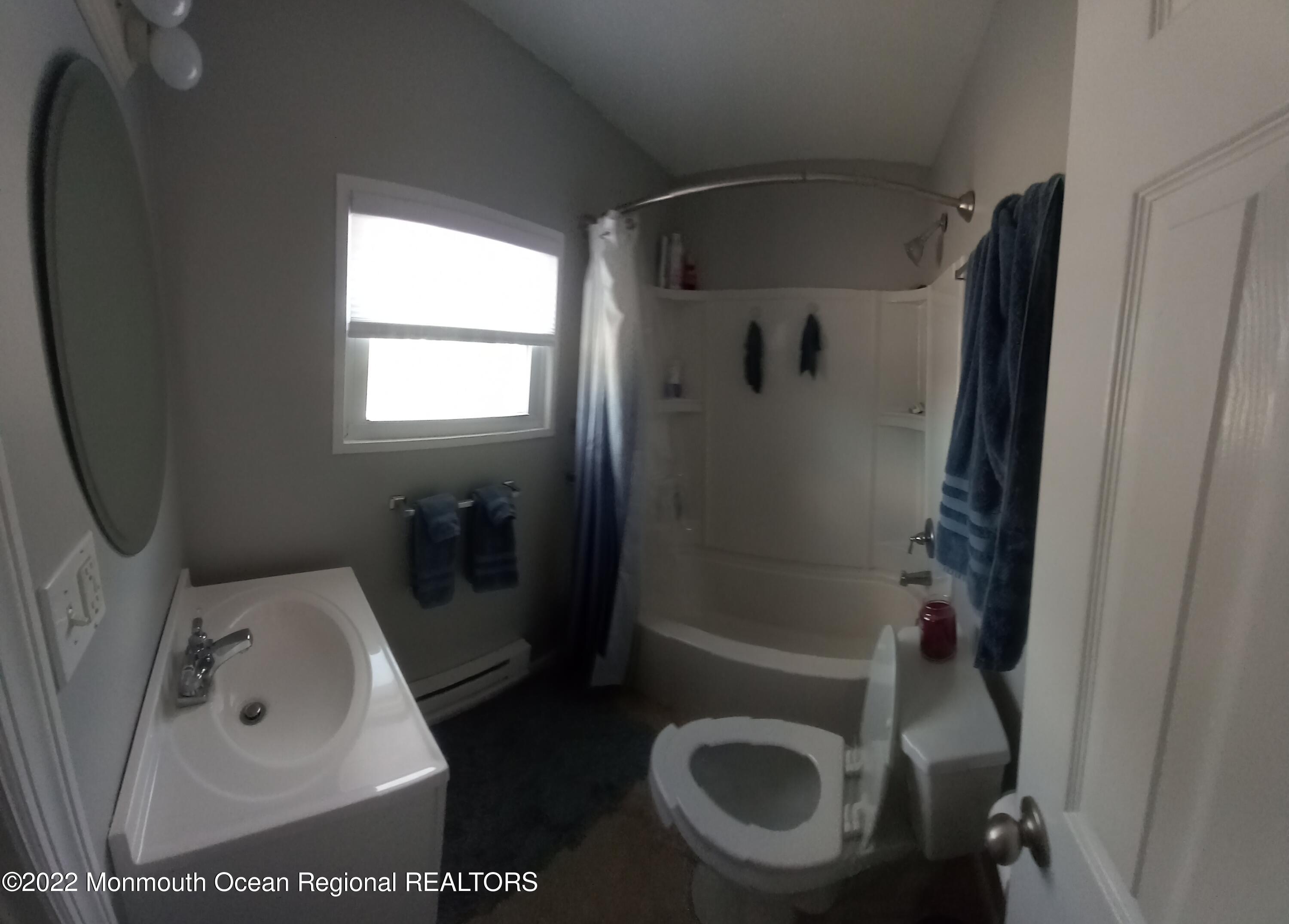 22 Ship Drive Little Egg Harbor, NJ 08087 - Photo 21 of 45 a bathroom with a sink and toilet