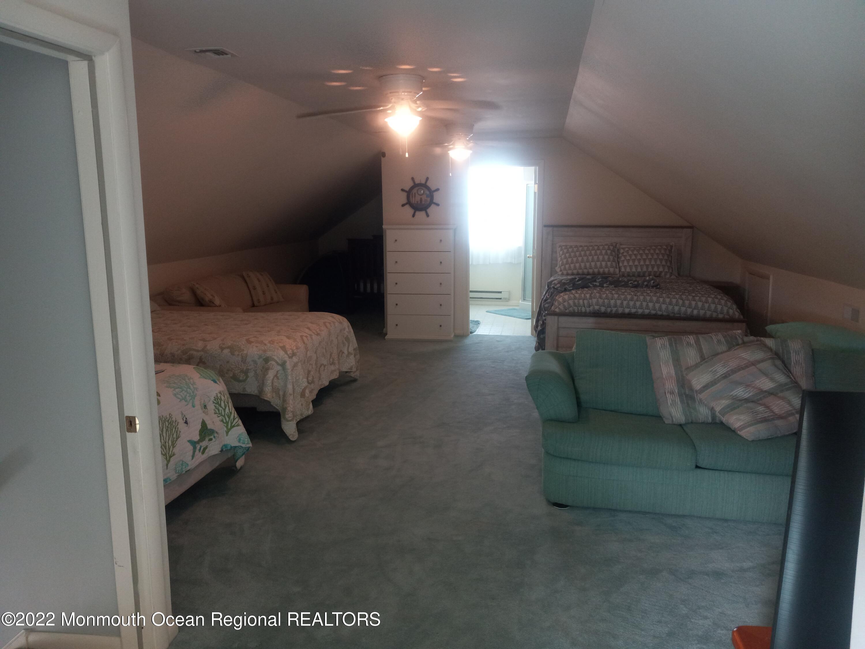 22 Ship Drive Little Egg Harbor, NJ 08087 - Photo 25 of 45 a en suite bathroom with a sink and a mirror