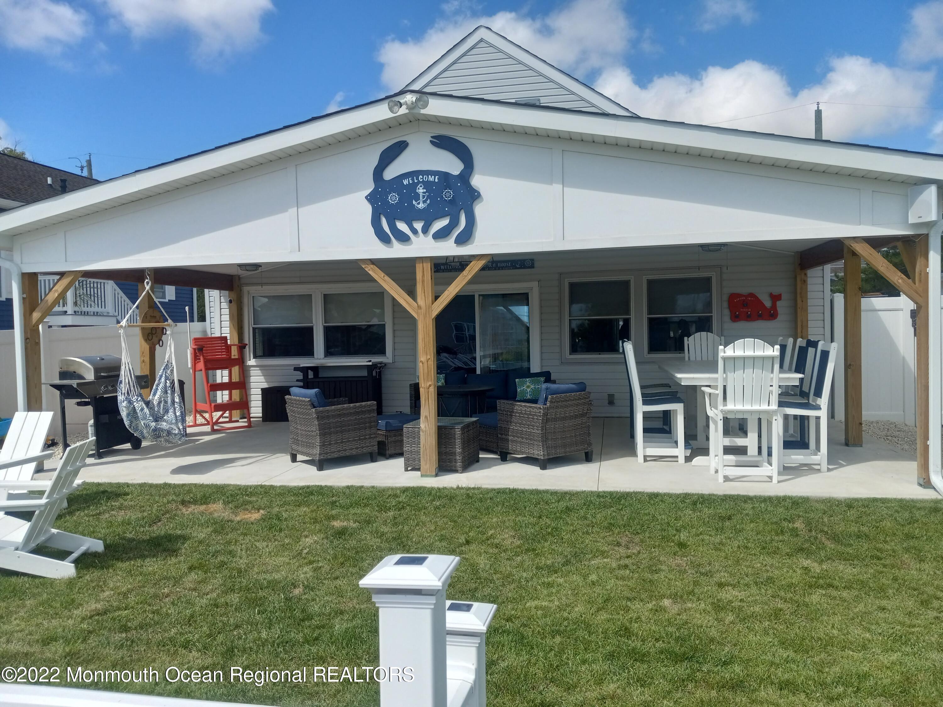 22 Ship Drive Little Egg Harbor, NJ 08087 - Photo 31 of 45 a view of a chairs and table in patio