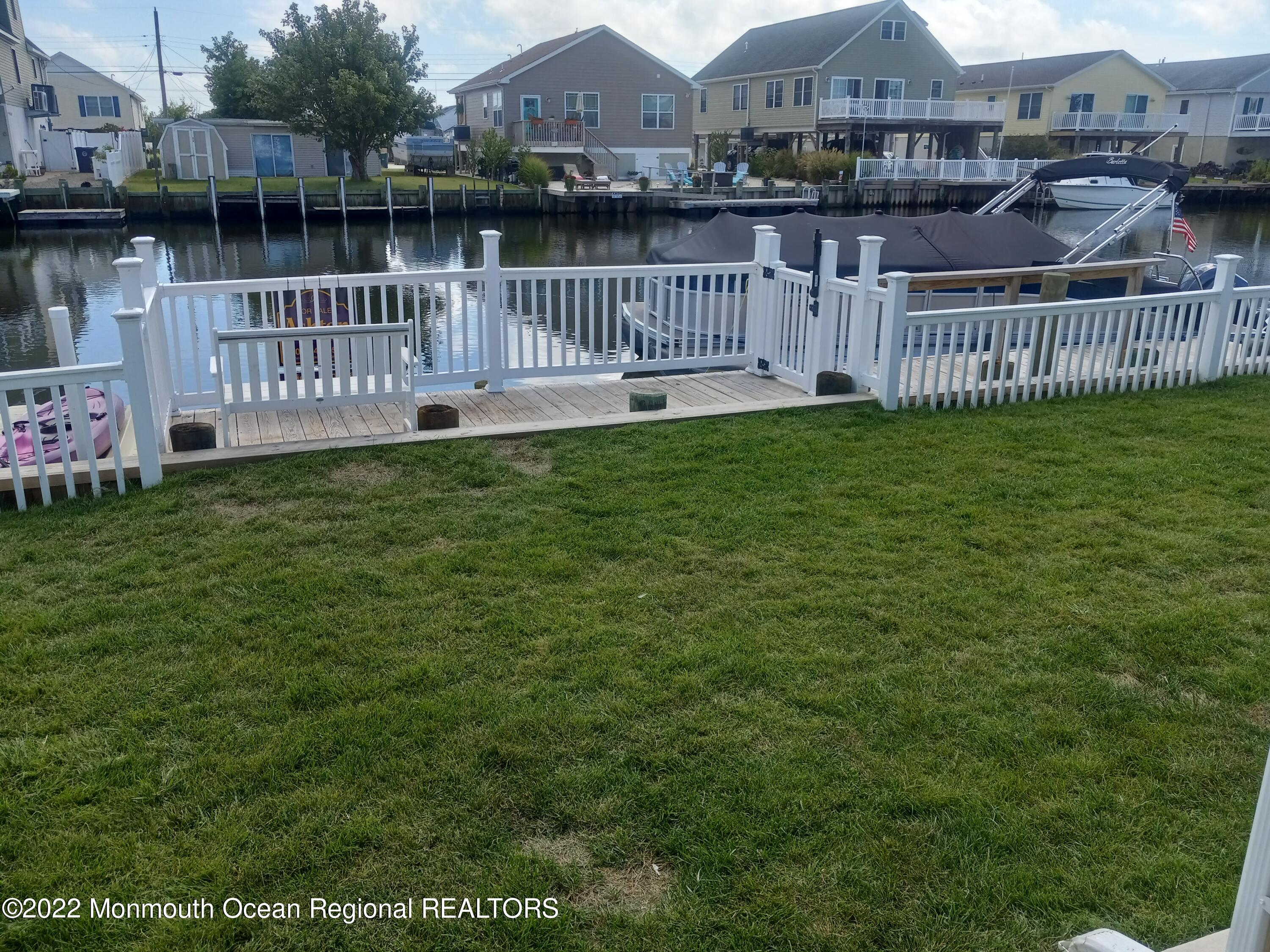 22 Ship Drive Little Egg Harbor, NJ 08087 - Photo 40 of 45 a view of house with a yard and deck