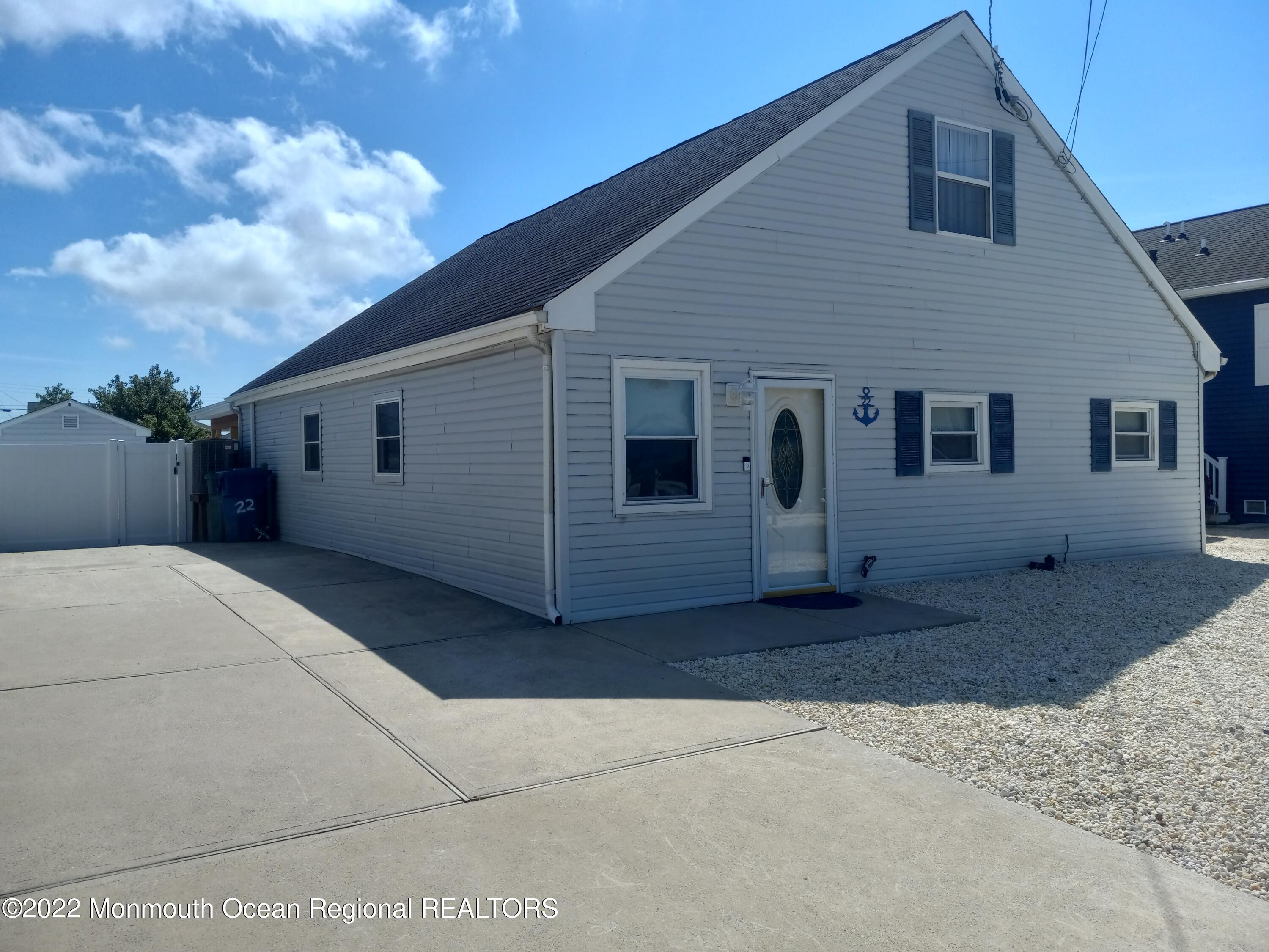22 Ship Drive Little Egg Harbor, NJ 08087 - Photo 4 of 45 a view of a house with a backyard