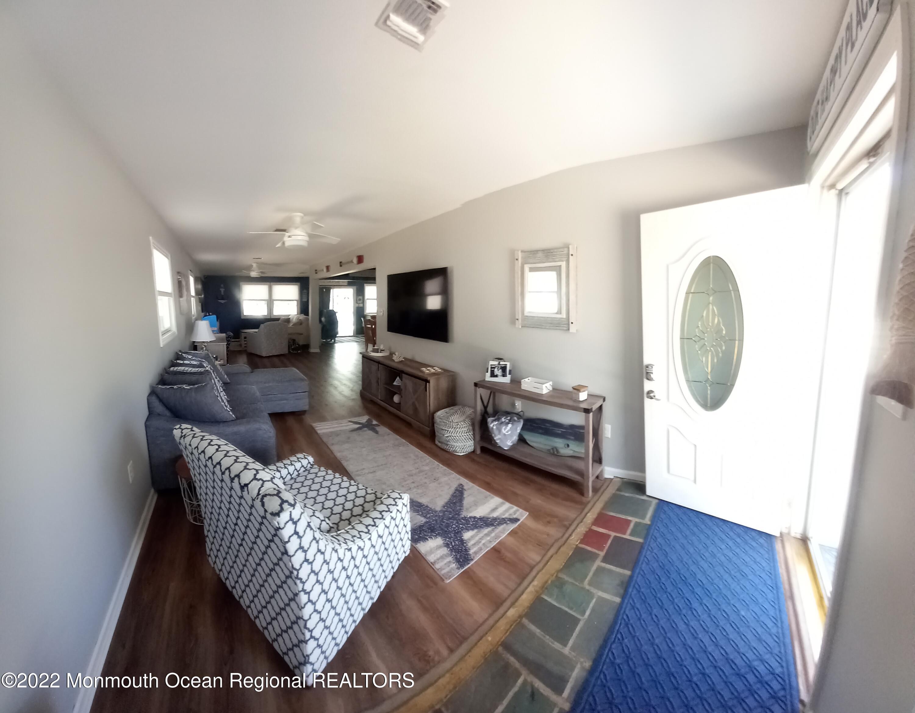 22 Ship Drive Little Egg Harbor, NJ 08087 - Photo 6 of 45 a living room with furniture rug and wooden floor