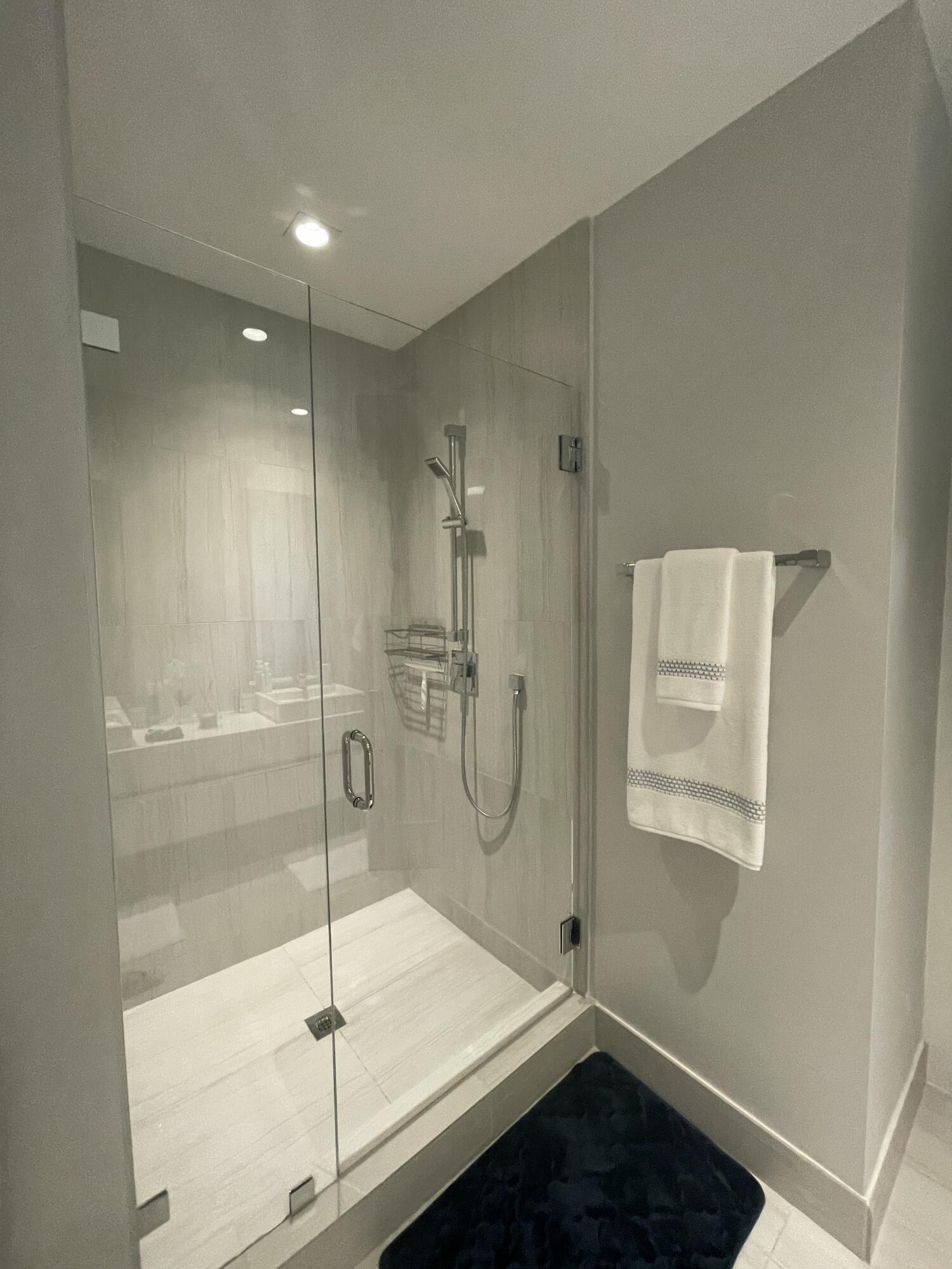 155 East Boca Raton Road, Unit 313 Boca Raton, FL 33432 - Photo 12 of 35 a bathroom with a shower