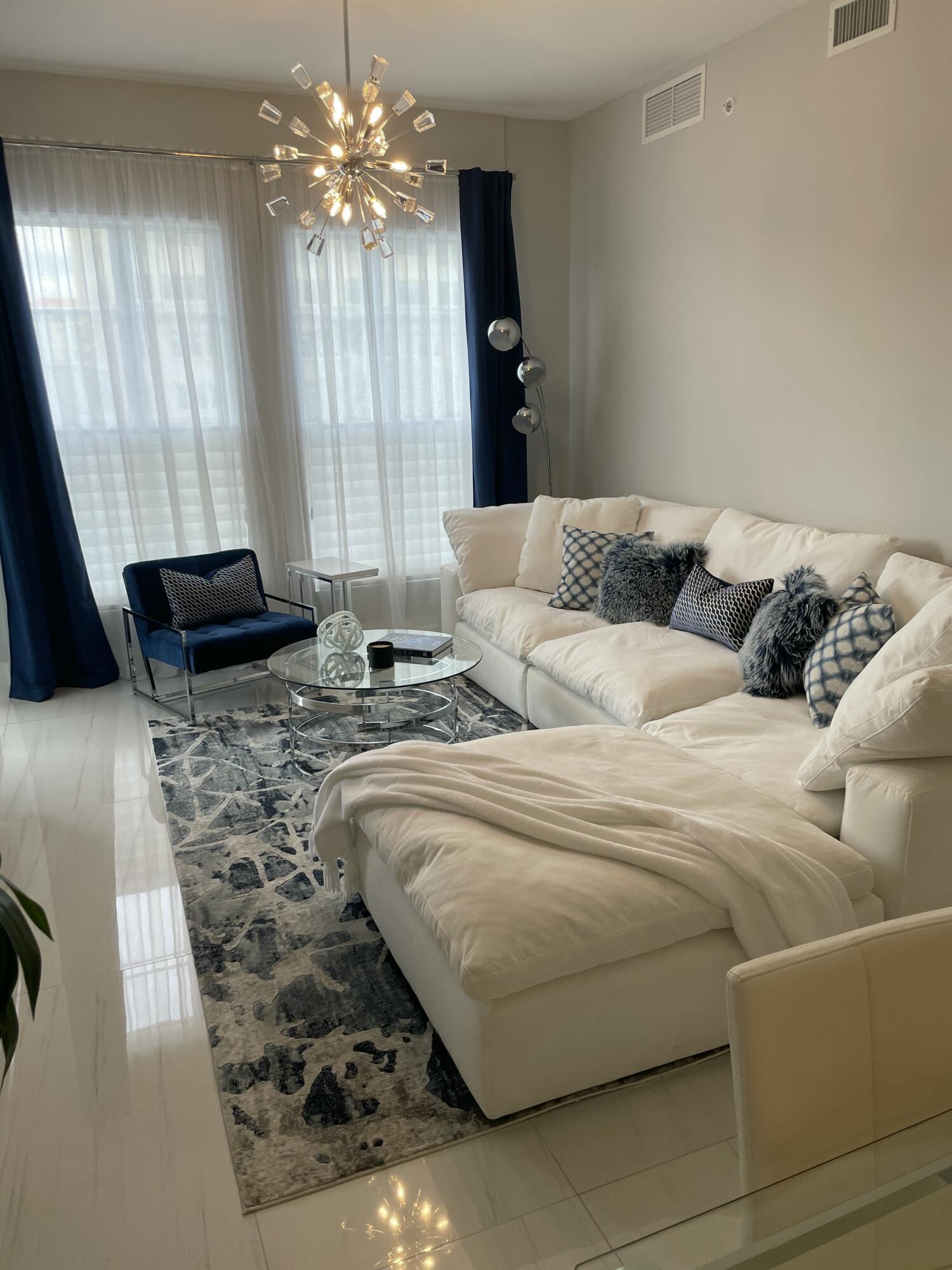 155 East Boca Raton Road, Unit 313 Boca Raton, FL 33432 - Photo 7 of 35 a bedroom with a bed and window