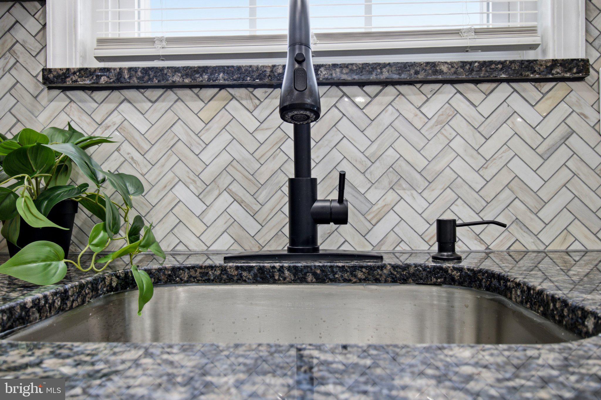 403 Kosoak Road Middle River, MD 21220 - Photo 14 of 23 Sleek kitchen sink with modern accents.