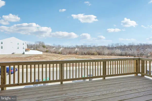 a view of balcony with furniture