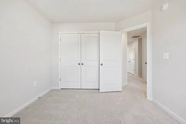 a bathroom with a shower and a toilet