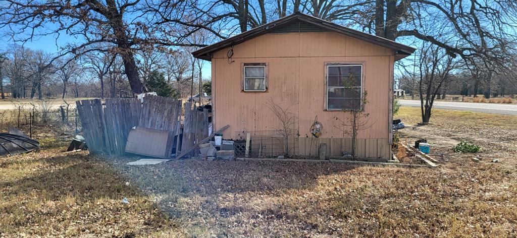 4428 Highway 154 Yantis, TX 75497 - Photo 4 of 6 a view of a house with a yard
