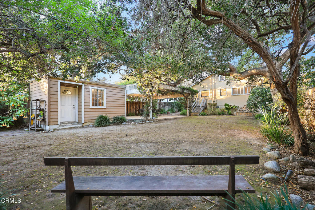 1870 Brigden Road Pasadena, CA 91104 - Photo 32 of 46 a view of a house with backyard and trees