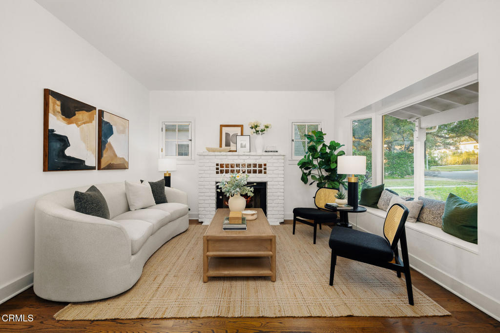 1870 Brigden Road Pasadena, CA 91104 - Photo 8 of 46 a living room with furniture and a fireplace