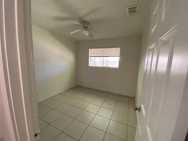 en empty room with windows
