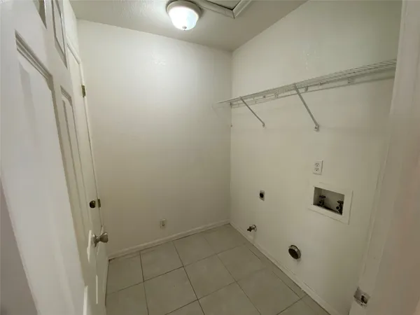 a bathroom with a shower and a shower