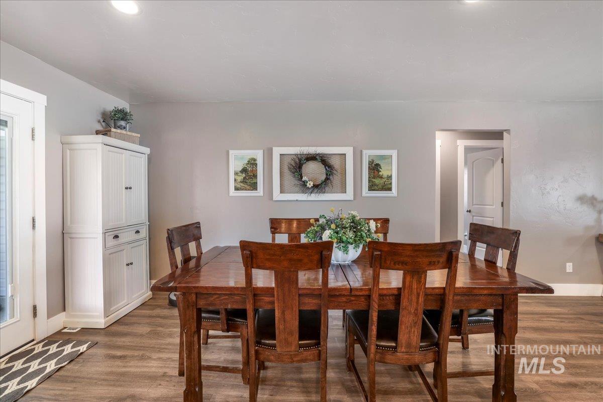 4076 North 3446 East Kimberly, ID 83341 - Photo 14 of 45 Dining room with wood finished floors and baseboards