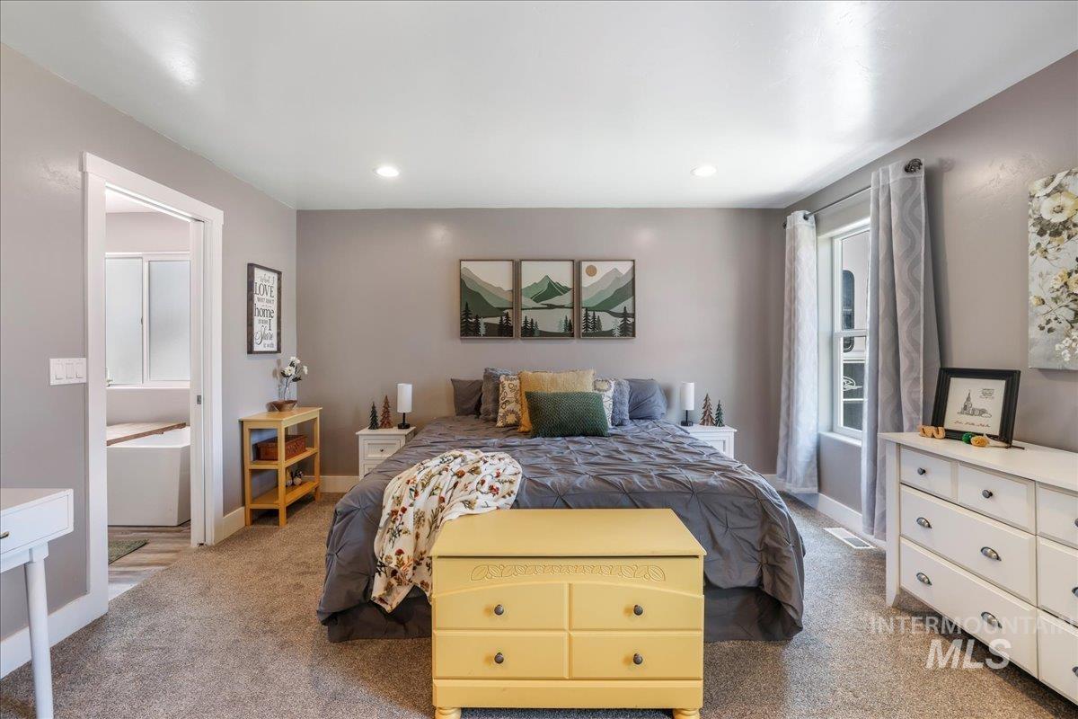 4076 North 3446 East Kimberly, ID 83341 - Photo 16 of 45 Carpeted bedroom featuring baseboards and recessed lighting