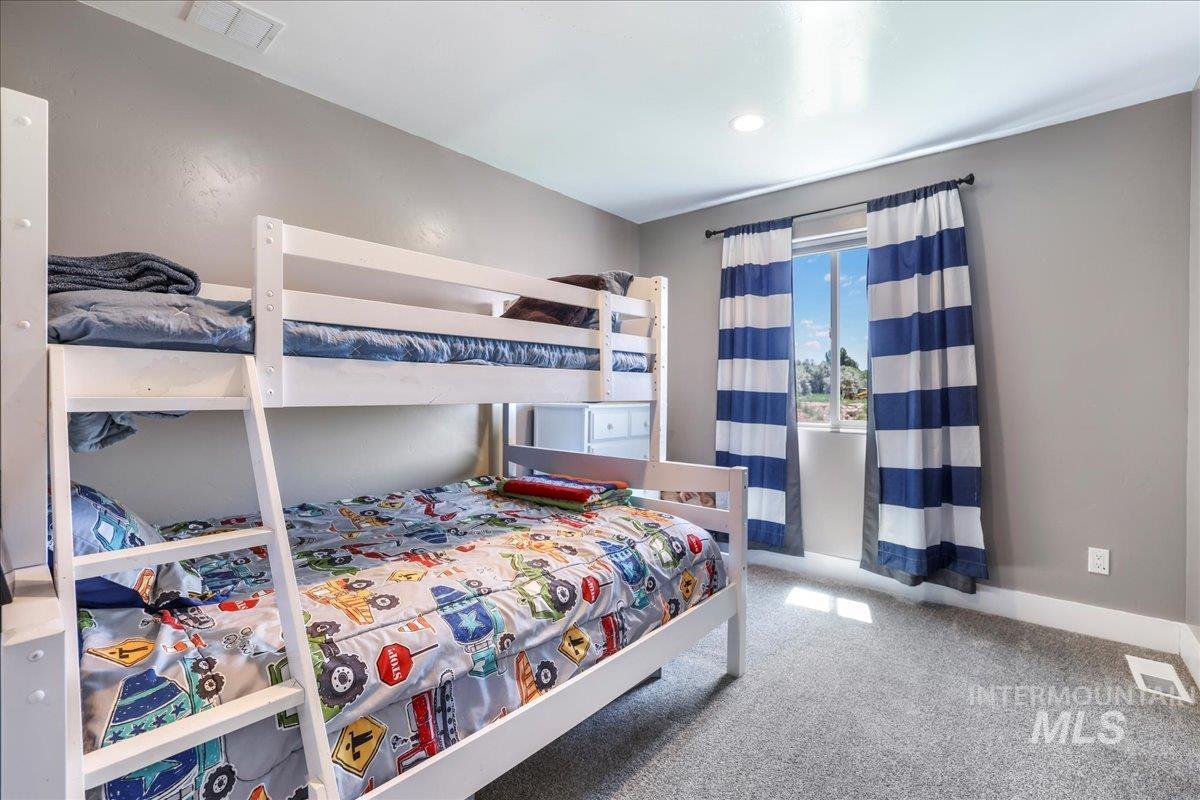 4076 North 3446 East Kimberly, ID 83341 - Photo 20 of 45 Bedroom featuring carpet and baseboards