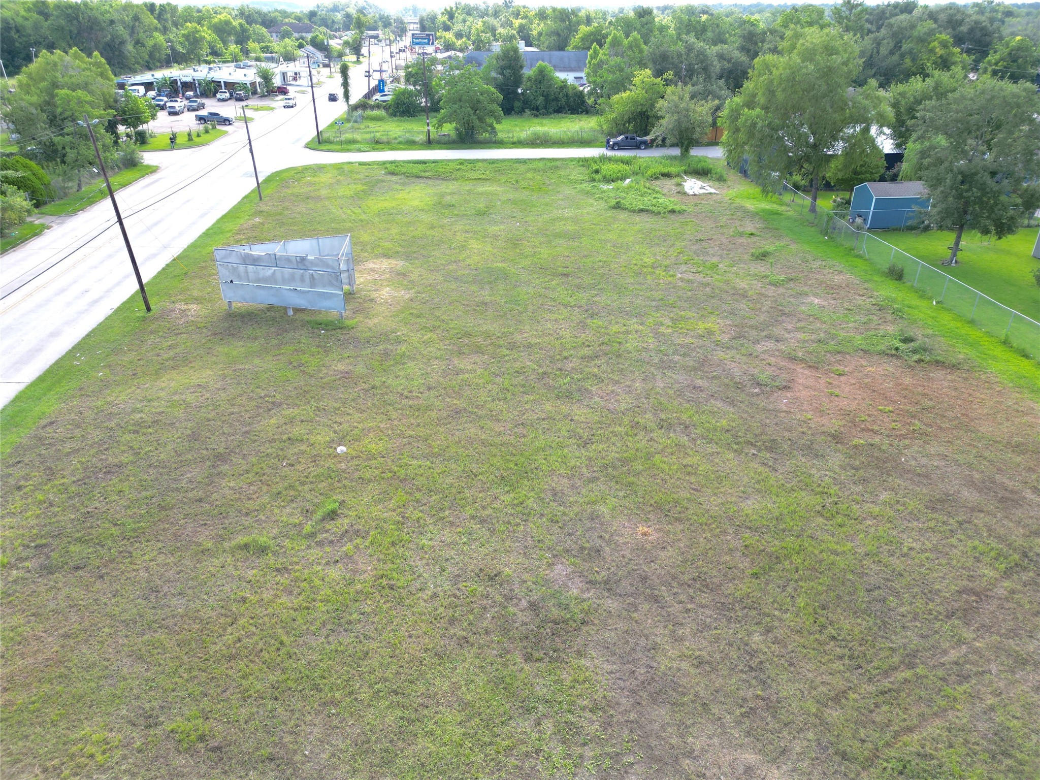 0 Hopper Road Houston, TX 77093 - Photo 6 of 9 a view of a green yard with a house