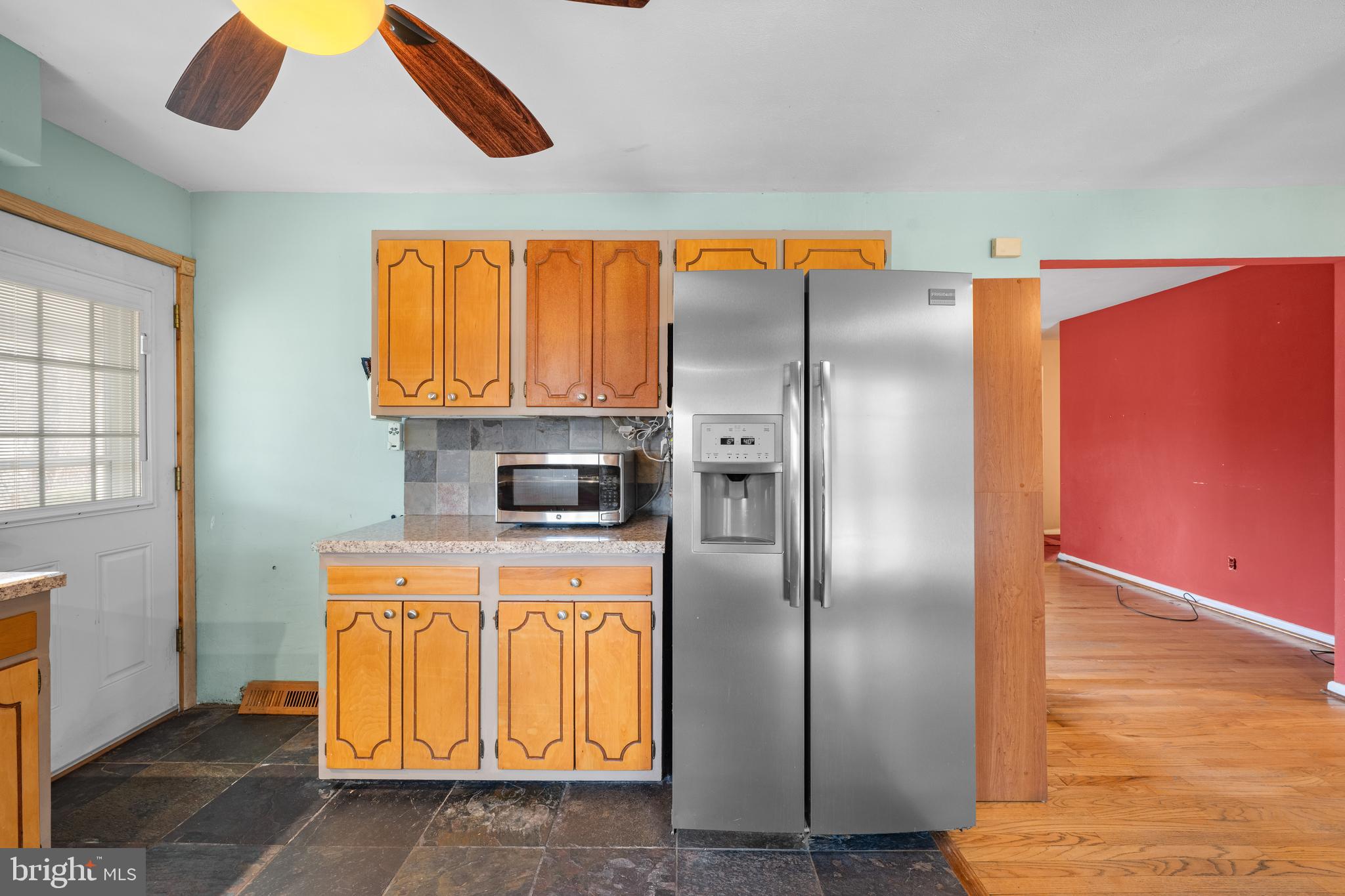 866 North Brewster Road Vineland, NJ 08361 - Photo 19 of 46 a kitchen with stainless steel appliances granite countertop a refrigerator a stove and a sink