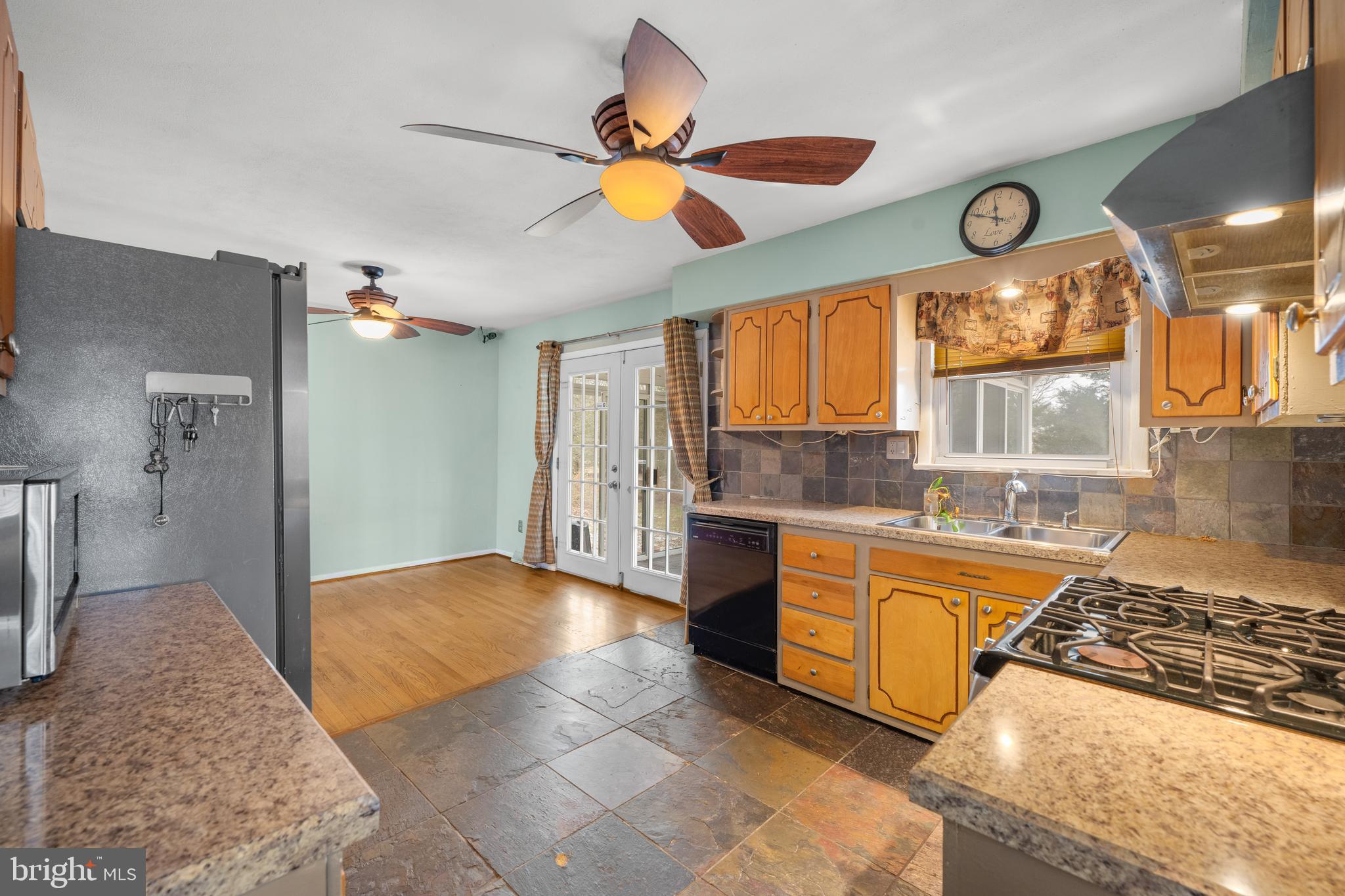 866 North Brewster Road Vineland, NJ 08361 - Photo 20 of 46 a large kitchen with stainless steel appliances granite countertop a stove and a sink