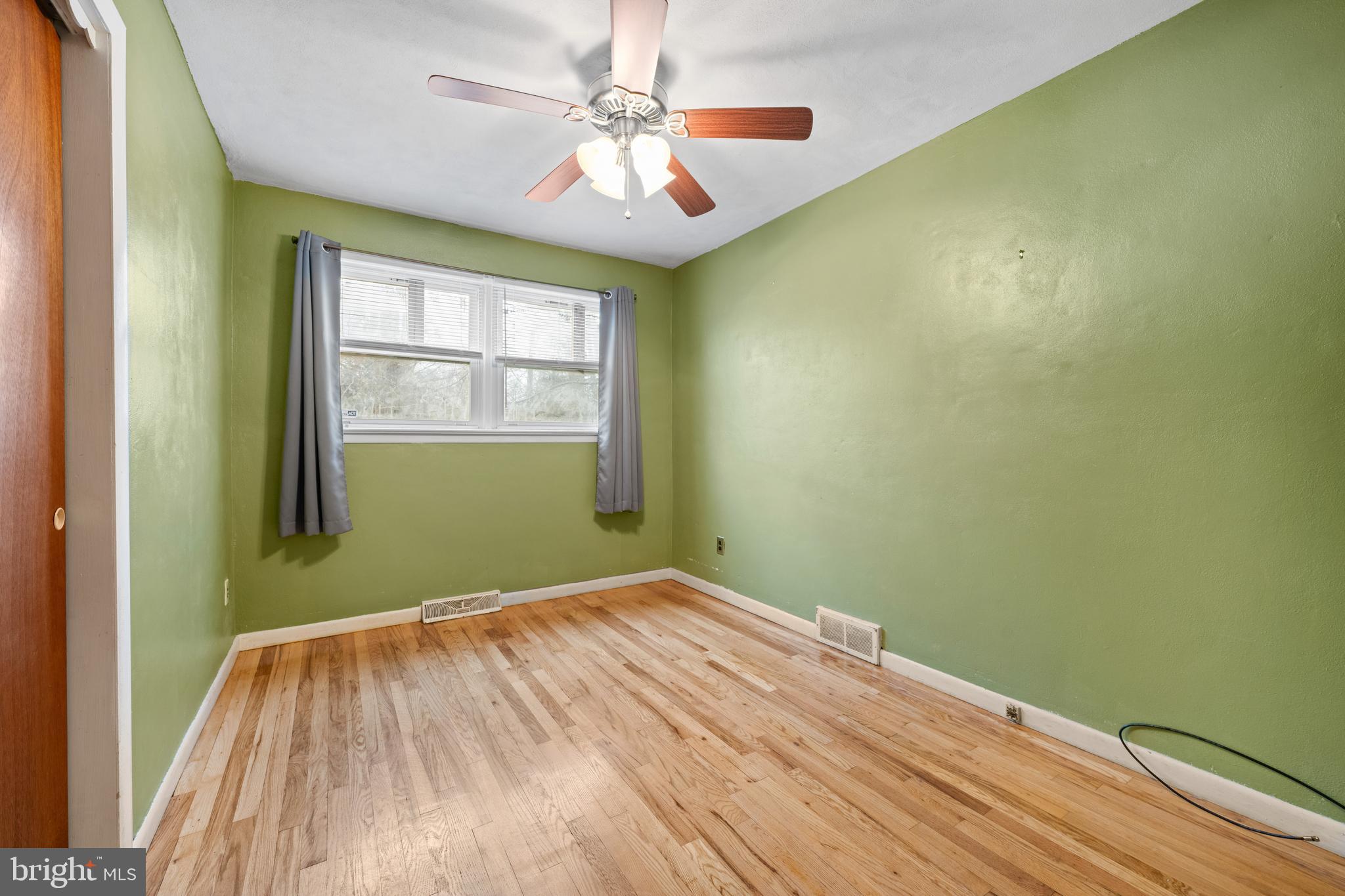 866 North Brewster Road Vineland, NJ 08361 - Photo 25 of 46 a view of a room with a ceiling fan and a window