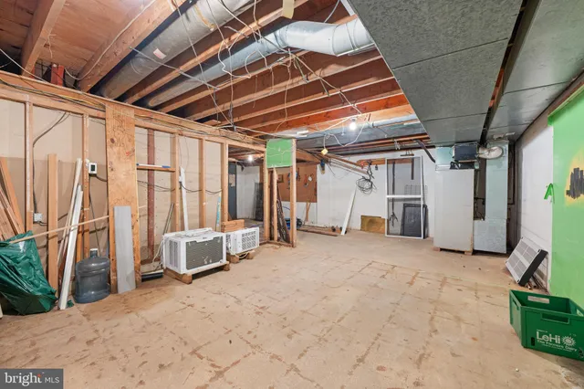 a view of an empty room and windows