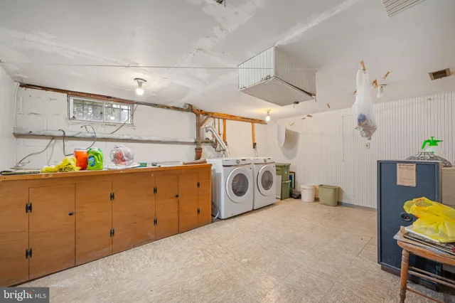 a view of a yard with a large tree