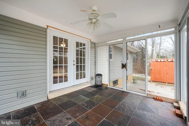 a front view of a house with swing yard
