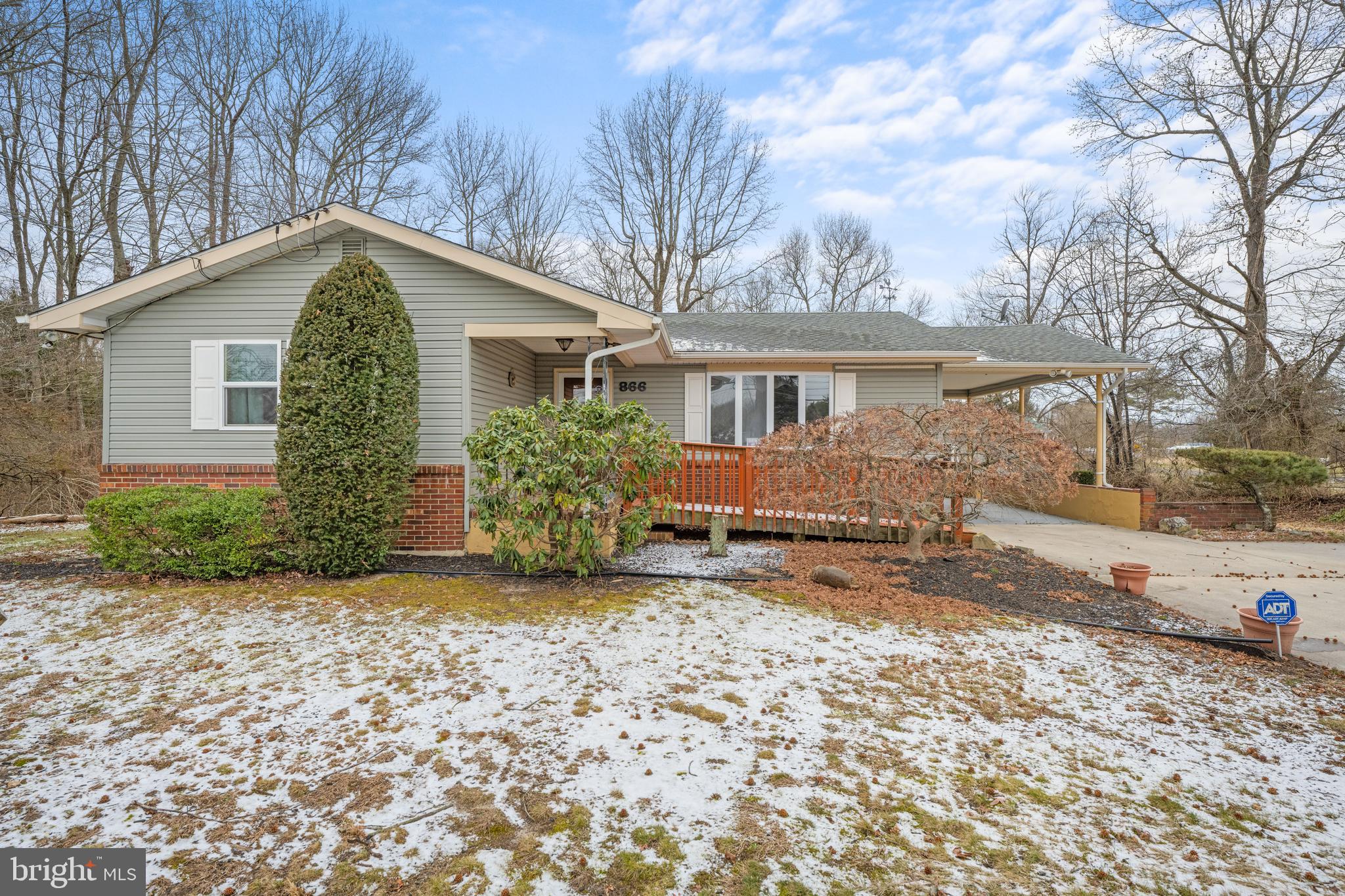 866 North Brewster Road Vineland, NJ 08361 - Photo 39 of 46 a view of a house with a yard covered in snow