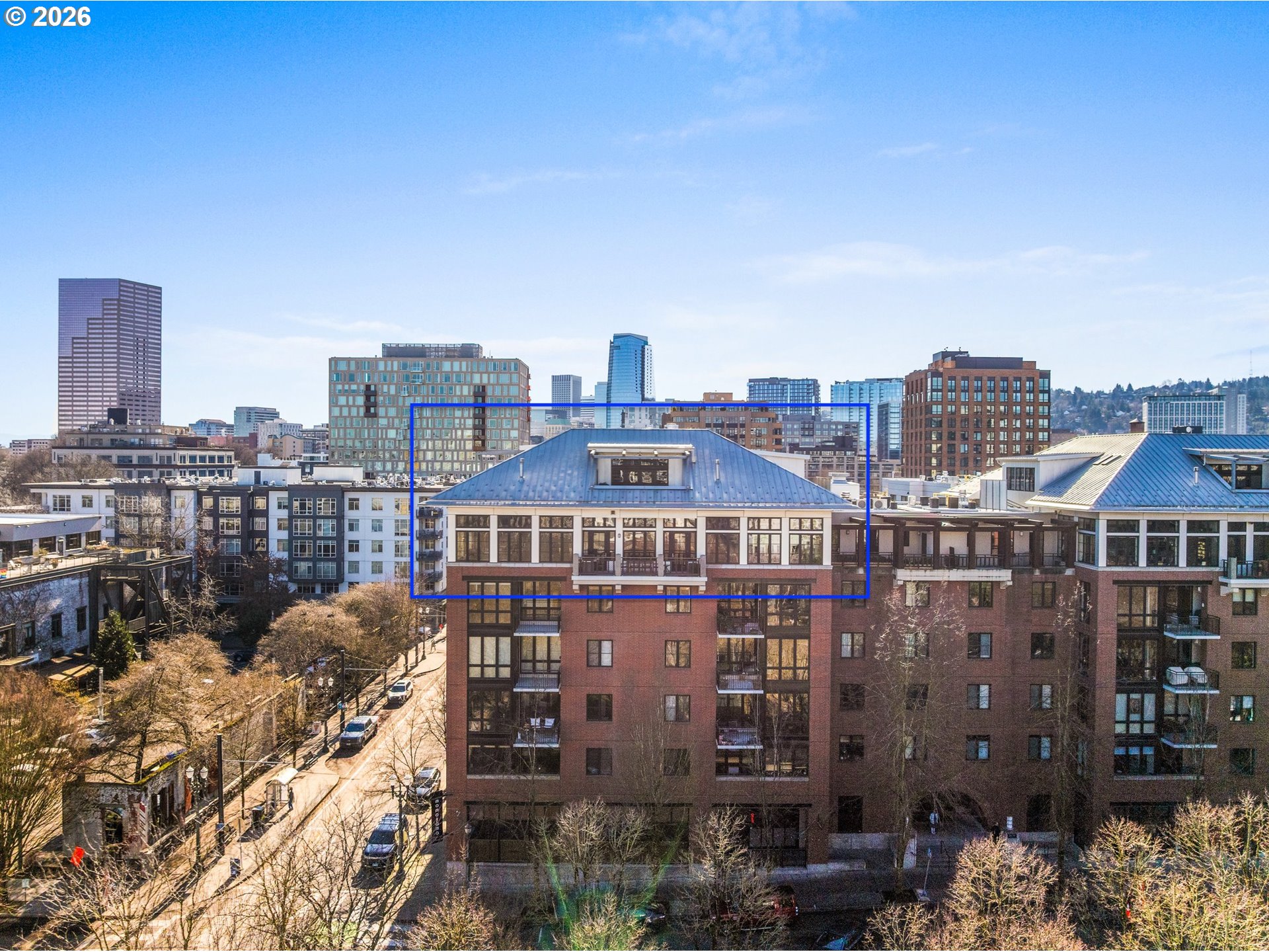 1030 Northwest Johnson Street, Unit 611 Portland, OR 97209 - Photo 1 of 34 a view of a city with tall buildings