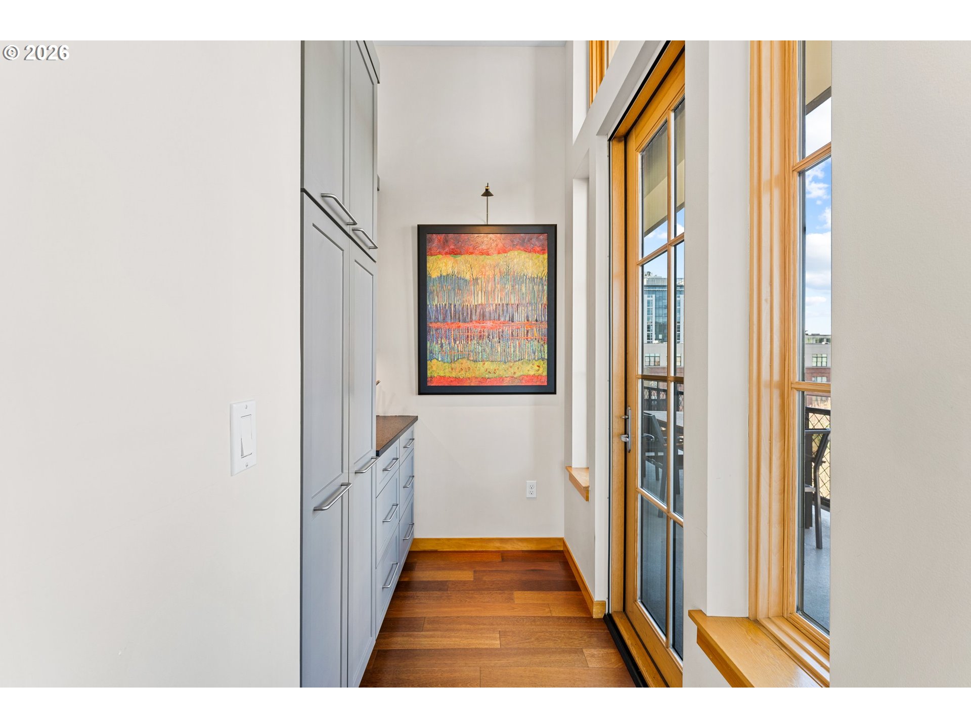 1030 Northwest Johnson Street, Unit 611 Portland, OR 97209 - Photo 15 of 34 a view of hallway with wooden floor