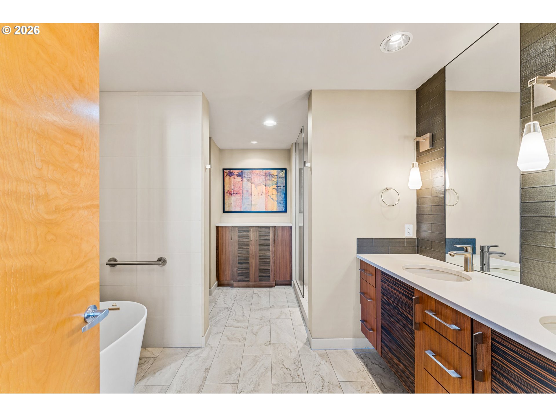 1030 Northwest Johnson Street, Unit 611 Portland, OR 97209 - Photo 20 of 34 a bathroom with a sink a toilet and shower