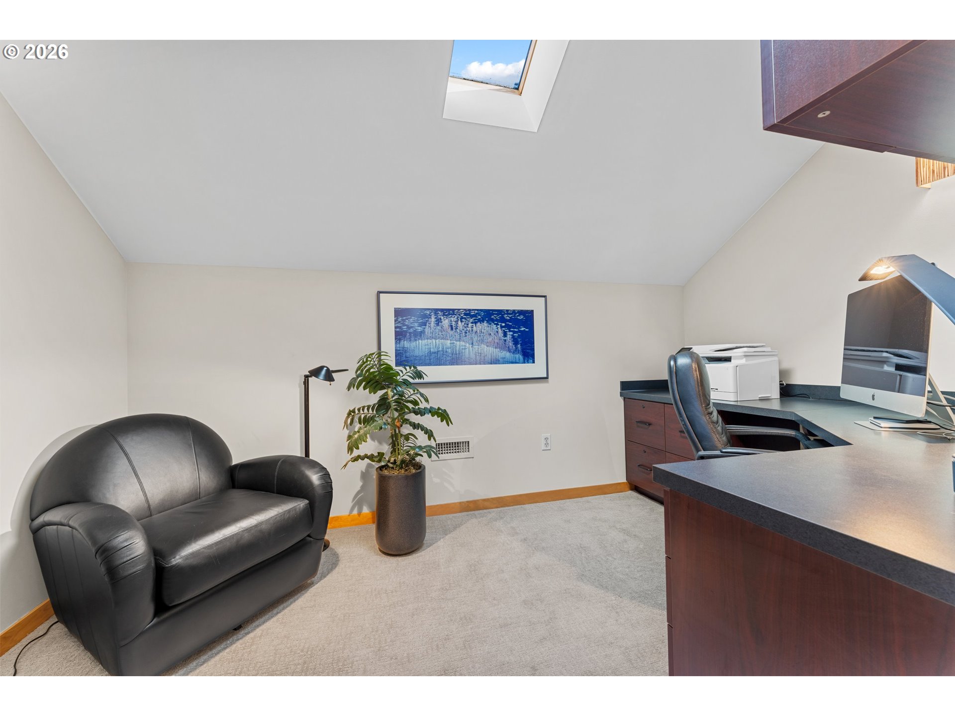 1030 Northwest Johnson Street, Unit 611 Portland, OR 97209 - Photo 27 of 34 a living room with furniture and a flat screen tv