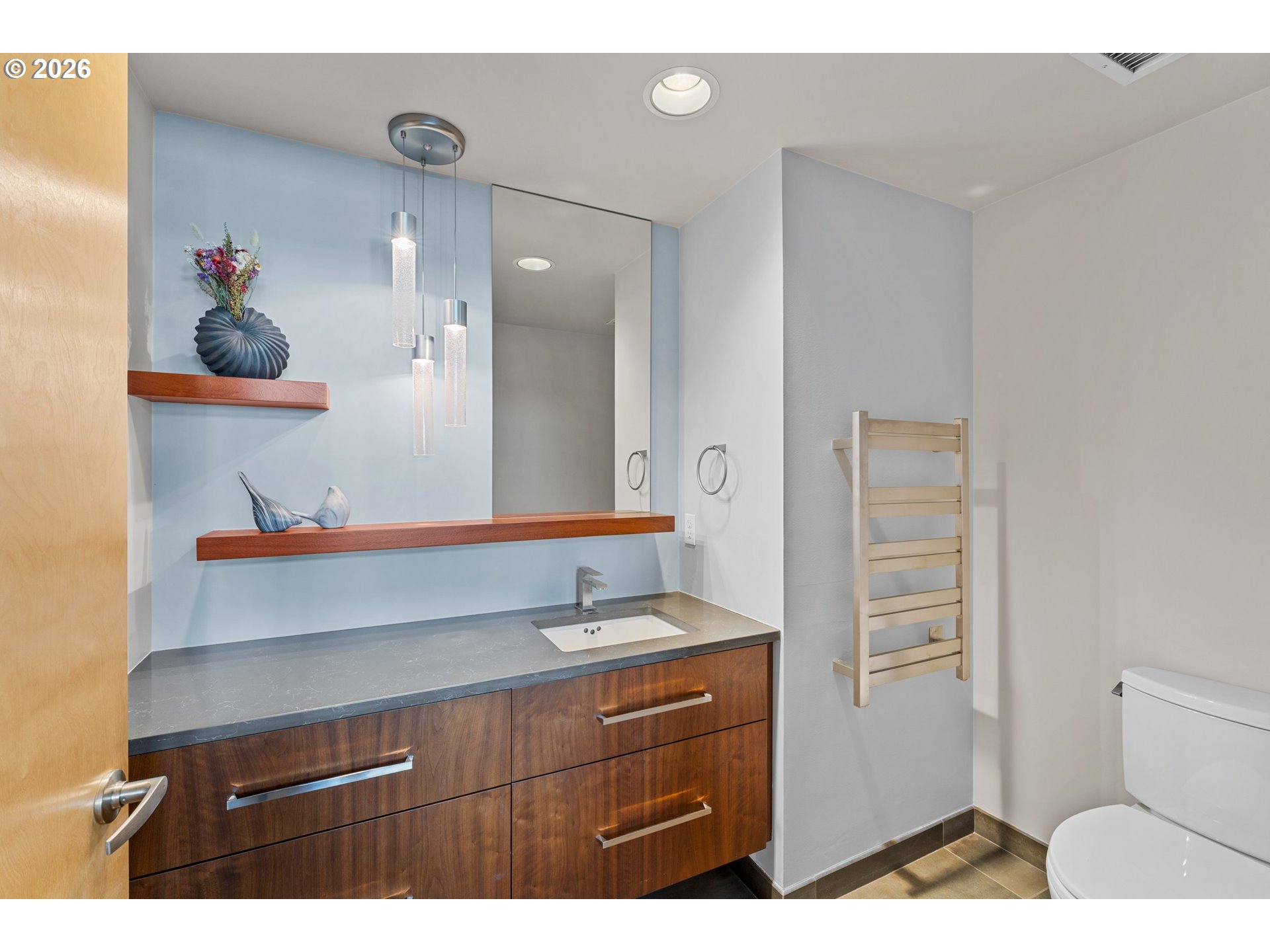 1030 Northwest Johnson Street, Unit 611 Portland, OR 97209 - Photo 28 of 34 a bathroom with a sink and a mirror