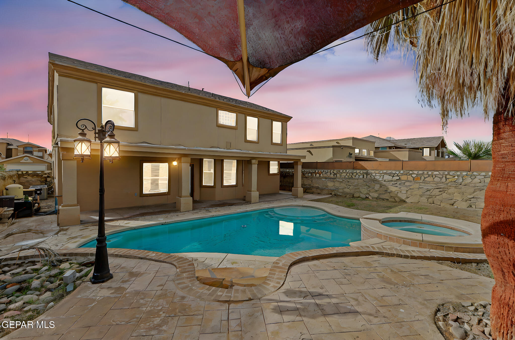 3644 Tierra Inca Drive El Paso, TX 79938 - Photo 47 of 53 a view of a house with a swimming pool