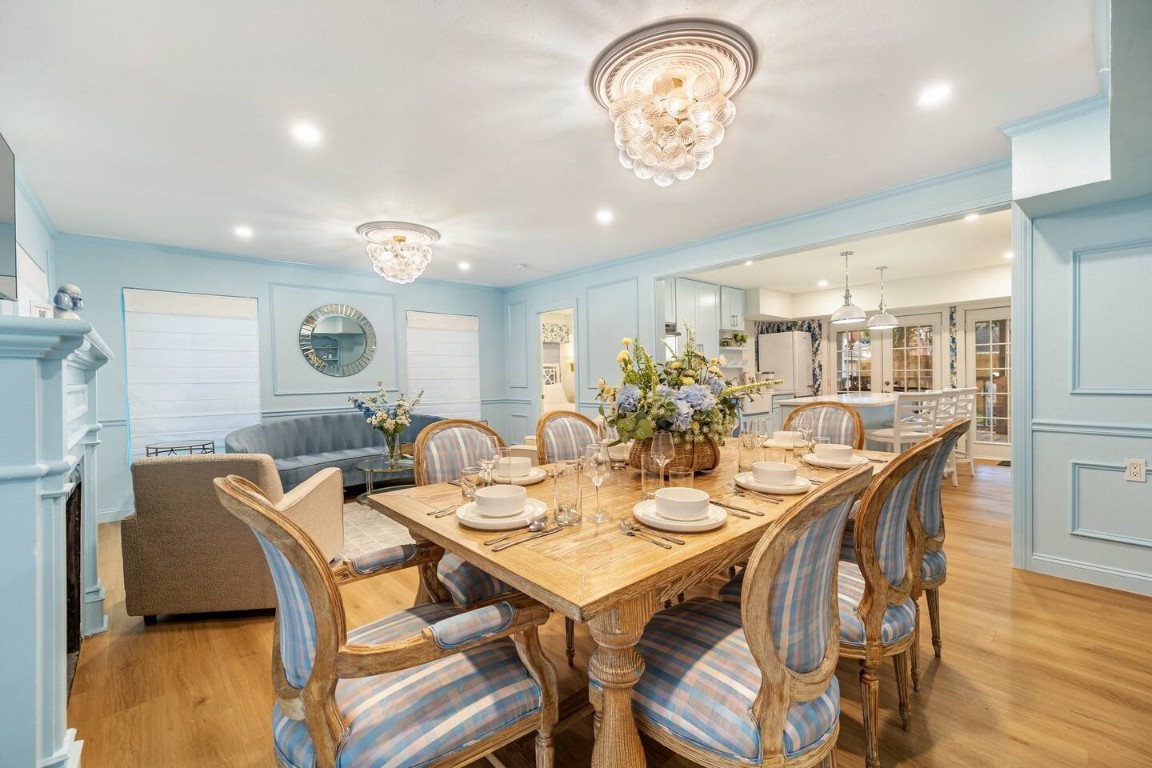 3236 Binz Street Houston, TX 77004 - Photo 3 of 50 a view of a dining room with furniture and wooden floor